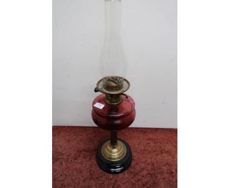 Late Victorian brass and cranberry glass reservoir oil lamp 