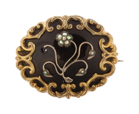 A Victorian split pearl and black enamel floral mourning brooch, unmarked gilt-metal settings with open panel back, brooch le