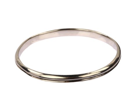 JENS JOHS AAGAARD - a Danish modernist sterling silver slave bangle, with central groove, band width 5.9mm, internal circumfe