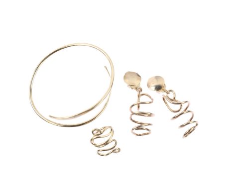 A handmade sterling silver abstract demi-parure, comprising ring, bangle and pair of clip-on earrings, by Claude Wilkes, ring