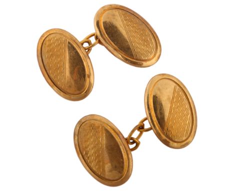 A pair of Art Deco 9ct gold oval cufflinks, with engine turned decoration, maker's marks HG&S, hallmarks Chester 1932, panel 