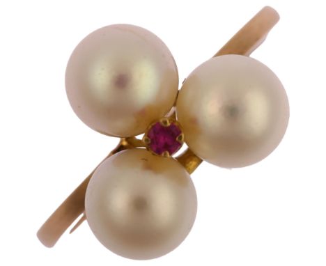 An Antique whole pearl and ruby trio ring, unmarked gold settings, setting height 11.8mm, size K, 2.9gRing has been re-purpos