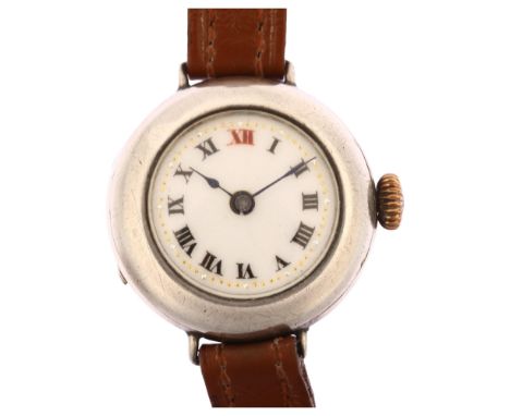 A First World War Period silver Officer's trench style mechanical wristwatch, white enamel dial with Roman numeral hour marke