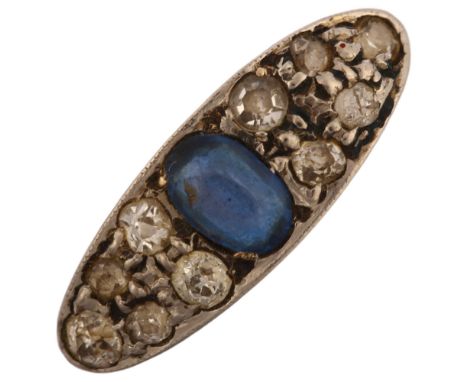 An early 20th century 18ct gold sapphire doublet and diamond cluster panel ring, platinum-topped set with oval mixed-cut coru