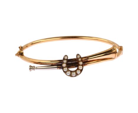 A Victorian 15ct gold split pearl hunting horn and horseshoe hinged bangle, horseshoe height 13.2mm, internal circumference 1