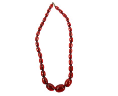 A graduated single-strand cherry amber bead necklace, beads ranging from 20.6-11.9mm, necklace length 40cm, 27.4gNo damage or
