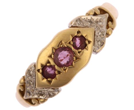 A late 20th century 9ct gold ruby and diamond gypsy ring, hallmarks Birmingham 1992, setting height 7.1mm, size W, 3gNo damag