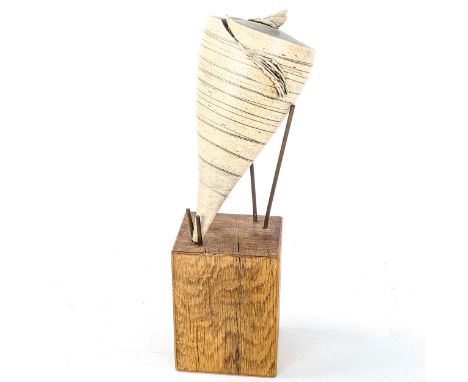 A 1970s German ceramic sculpture, on metal pin and oak base, overall height 36cmGood condition, bought by current vendor in G