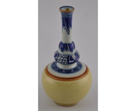 A Kangxi style double gourd vase and elongated neck with blue and white decoration to the top and tan coloured main body, bea