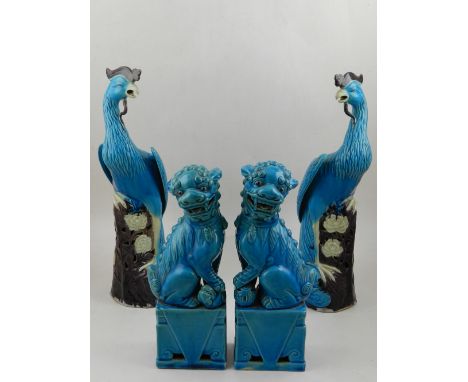 A pair of Chinese turquoise glazed pottery dogs of Fo, h:26cm, together with a pair of similar glazed exotic birds