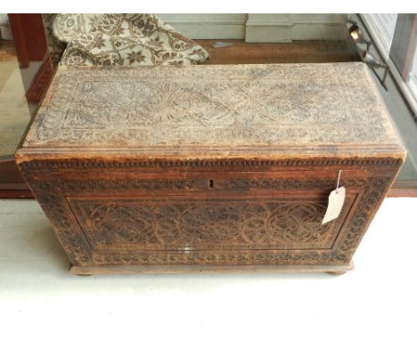 A 19th Century Continental hardwood trunk with chip carved geometric decoration,  w:100cm