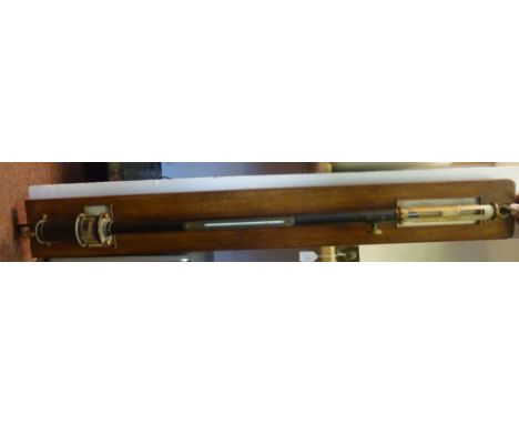 An early 20thC FD & Co, London marine stick barometer, No.4574, in lacquered steel and brass with an attendant thermometer at