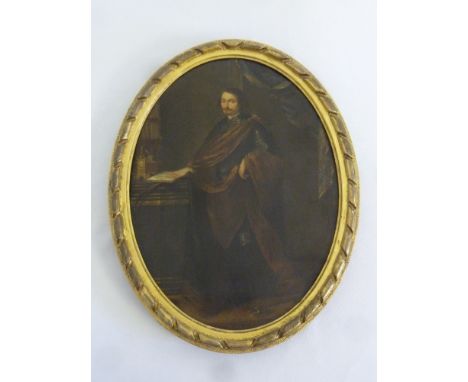 A framed oval oil on copper portrait of a gentleman wearing armour in an interior scene, 33 x 25cm