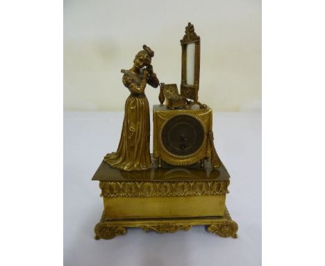 19th century Ormolu mantle clock in the form of a lady at her dressing table on raised rectangular base  A/F