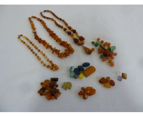 Three amber necklaces and a quantity of loose mixed stones to include amber and jade