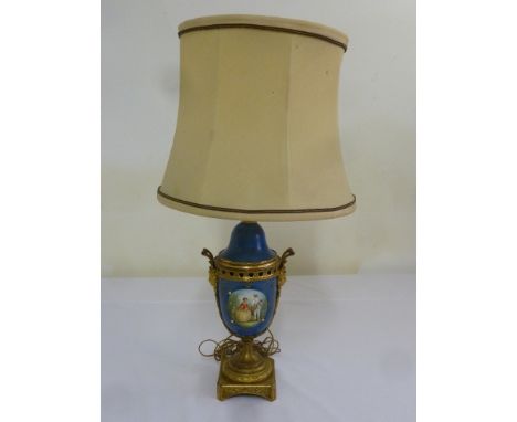 Sevres style table lamp on raised gilt metal base and silk shade