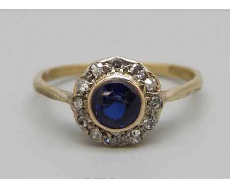 An 18ct gold 1920's sapphire and diamond cluster ring, 1.7g, O 