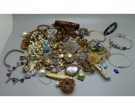 A silver and three stone diamond bangle, silver brooch and other costume jewellery including vintage 