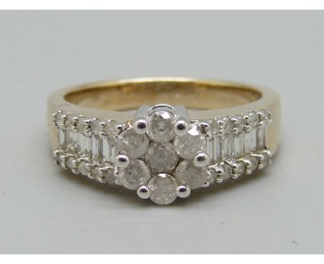 A 9ct gold thirty-seven diamond stone ring, 4.7g, P, boxed 