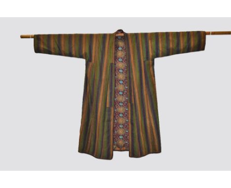 Two robes, the first an Afghan striped silk robe, Afghanistan, circa 1930s-40s, 26in. 66cm. Underarm; 44in. 112cm. Length fro