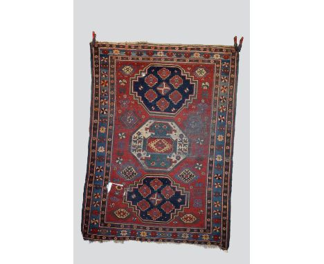 Two Kazak 3-medallion rugs, south west Caucasus, late 19th/early 20th century, both with red fields and ivory centre medallio