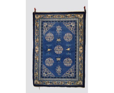 Two Tianjan rugs, north China, circa 1930s-40s, the first, 6ft. 9in. X 4ft. 2in. 2.05m. X 1.27m.  Overall wear, heavier in so