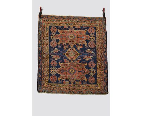 Three rugs: the first, Karaja, north west Persia, circa 1930s-40s, 4ft. 2in. X 3ft. 8in.  1.27m. X 1.12m. Slight wear in plac