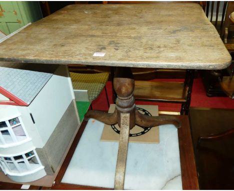 A 19th century provincial plank top oak round cornered tilt-top pedestal tripod table, width 72cm