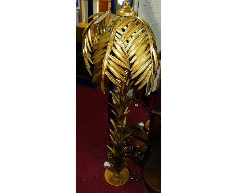 A contemporary gilt sprayed pressed metal floor lamp, in the form of a palm tree, height 158cmCondition report: IN GOOD CONDI