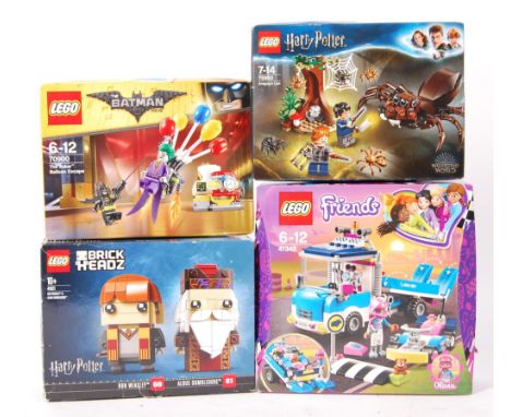 A collection of 4x assorted boxed Lego sets. Comprising: Harry Potter 75950 ' Aragog's Lair ', Harry Potter Brick Headz 41621