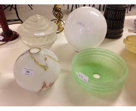 4 vintage glass light shades.
