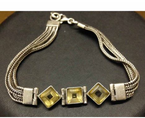 Ladies art deco style 925 silver bracelet with 3 square cut clear stones. Approx 19cm.