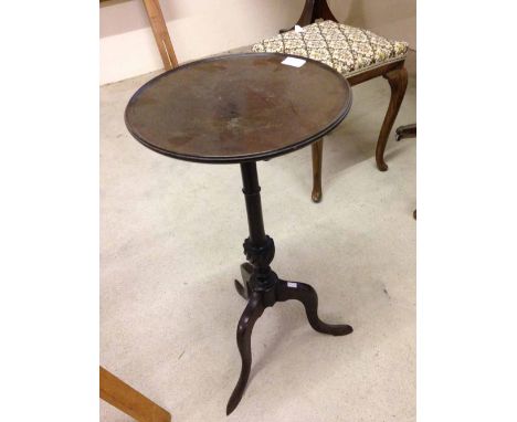 A tripod wine table.