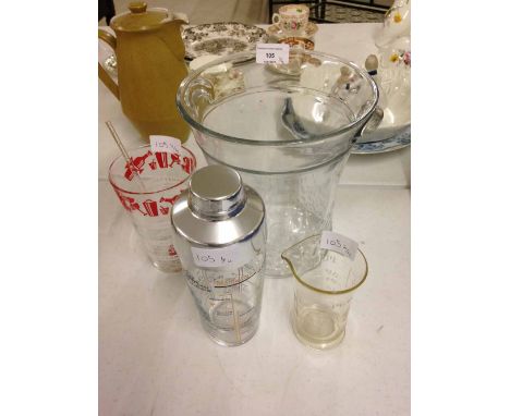 2 glass cocktail shakers, a vintage measuring beaker with engraved scale and a glass wine cooler.