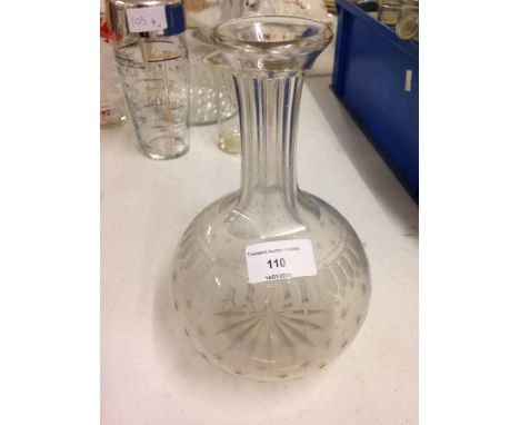 A 19th century engraved glass water decanter.