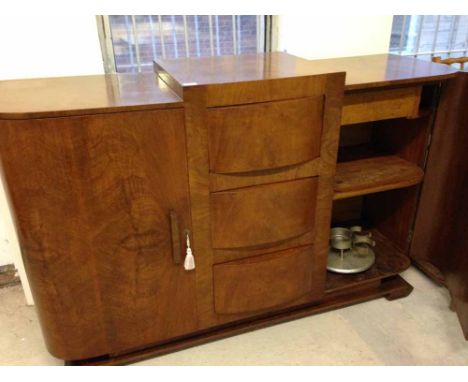 An original Art Deco sideboard with built in bottle carousel. 97 x 155 x 48cm.