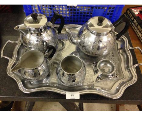 Silver plated tea service on tray.