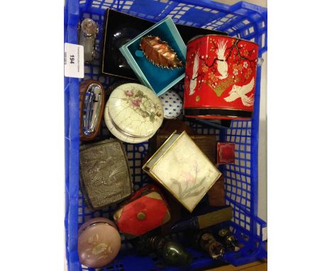 A tray of mixed odds to include enamel pill boxes and a Ronson lighter in wooden base.