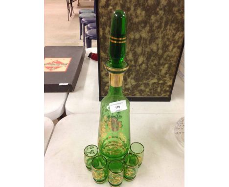A green glass decanter & 5 glasses.
