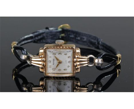 Rotary 9 carat gold ladies wristwatch, the square enamel dial with Arabic hours, gadrooned shoulders, leather strap, case 16m