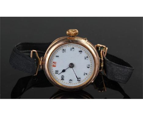 9 carat gold ladies wristwatch, with a white enamel dial, case size 26mm diameter