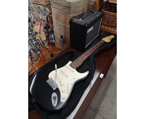 Encore electric guitar together with Laney amplifier. 