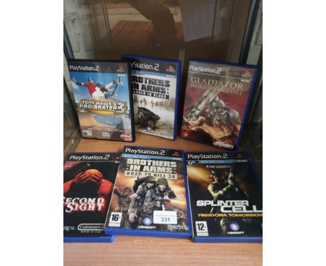 Shelf of playstation 2 games . 