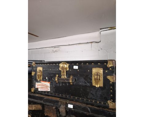 Large brass bounded travel trunk. 