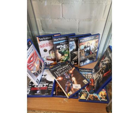 Shelf of playstation 2 games. 