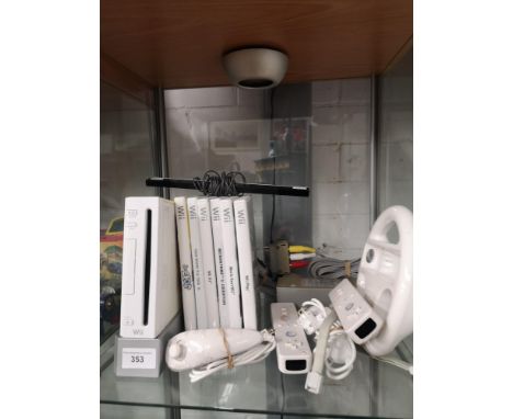 Nintendo wii console with games . 