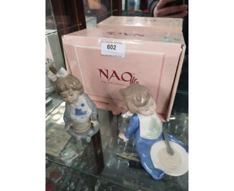 2 Nao baby figure s with box. 