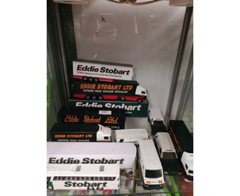 Shelf of eddie stobart truck models . 