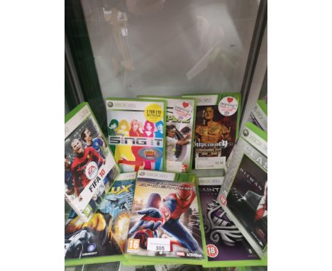 Shelf of xbox 360 games . 