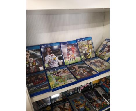 Shelf of playstation 4 games . 